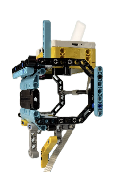 Wearable LEGO SPIKE prototype with a rectangular frame, hub, and attached cables.